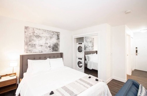 Downtown Winnipeg Apartment | Free Parking, Private Patio, Wi-Fi & Laundry!