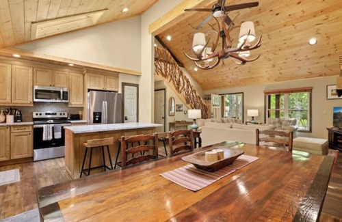 Charter Hills Cabin | French Flair Designed Custom Cabin with covered porch and gas firepit