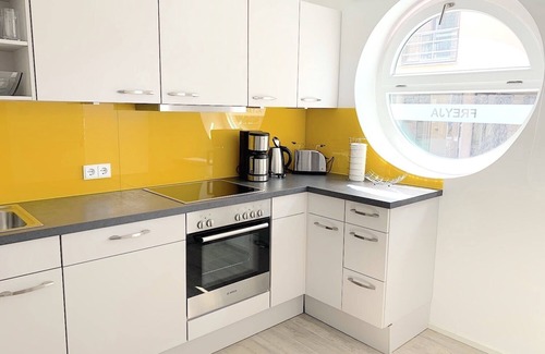 Eckernfoerde Apartment | Freyja vacation apartment at the tip of the harbor: comfort and proximity to the beach