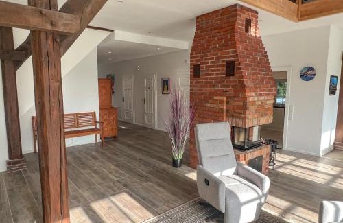 Stadland Apartment | Friesenhaus Ebbe für 6 Gäste mit großem Garten