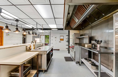 Presque Isle Cabin | Full hotel with bar, commercial kitchen, pool table & fireplaces - dog-friendly
