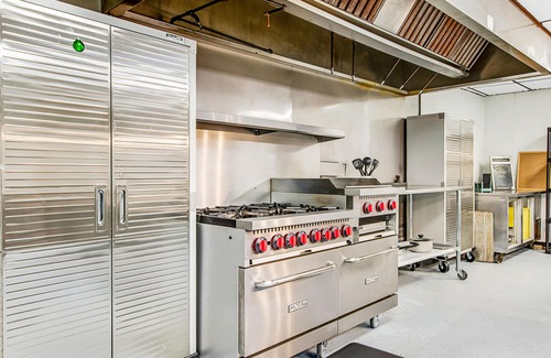 Presque Isle Cabin | Full hotel with bar, commercial kitchen, pool table & fireplaces - dog-friendly