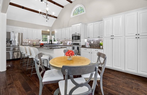 Peachtree City House | Fully equipped gourmet kitchen, vaulted ceilings, fire places, fire pit & grills