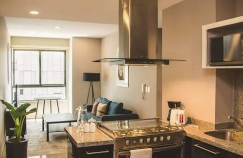 Ampliacion Granada Apartment | Fully equipped kitchen, high speed internet, comfy king-size bed and a sofa bed.