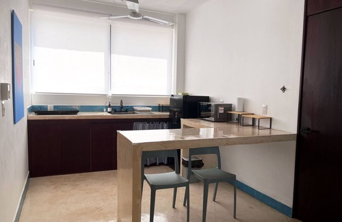 Barra de Colotepec Apartment | Fully equipped studio with AC and WiFi in Zicatela. Bed, kitchen and bathroom.