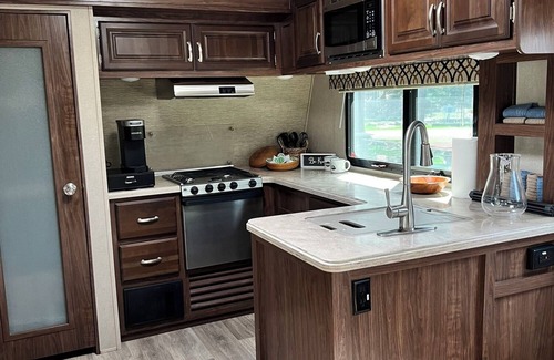 Weed House | Fully Equipped Travel Trailer in beautiful campground setting.