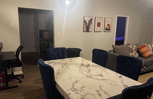 Church Street House | Fully Furnished Modern Home Patio with BBQ Grill for Relaxed Outdoor Living
