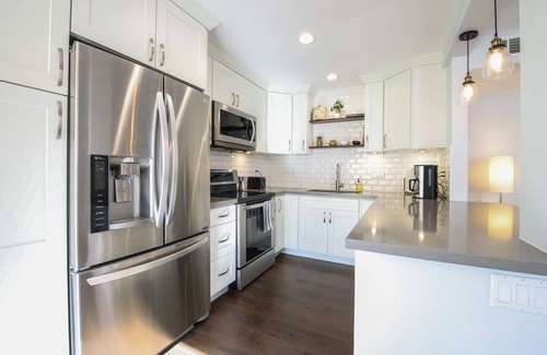 North Park House | Fully Renovated 3-Story Townhome - 93 Walk Score