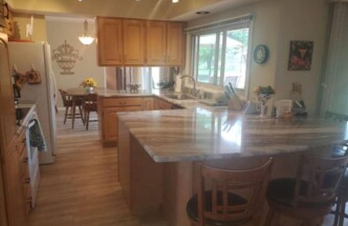 Black Wolf House | Fully updated channel front 4 br 2 ba home located minutes from Wittman Field.