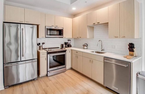 Buzzard Point Apartment | Furnished 1BR w Views, Rooftop & Pool | Waterfront