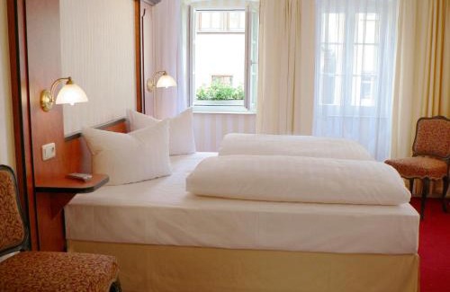 Schloßlein Hotel | Gästehaus Plönlein - Hotel Goldener Hirsch Rothenburg