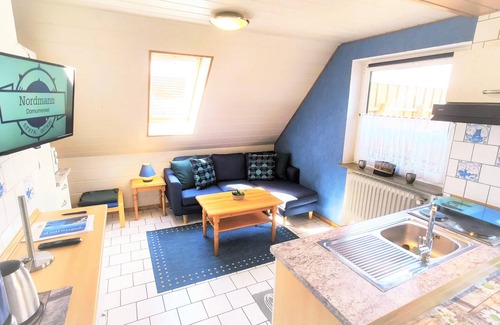 Dornumergrode Apartment | Gästehaus Zur alten Post - Wohnung Nord