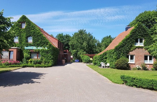 Dornumergrode Apartment | Gästehaus Zur alten Post - Wohnung Nord