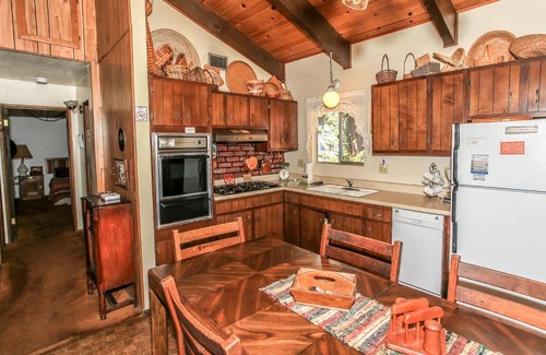 Summit Estates House | Gallagher's West - Pine surrounded deck and barbecue! Bumper Pool and Wet bar! Darts!