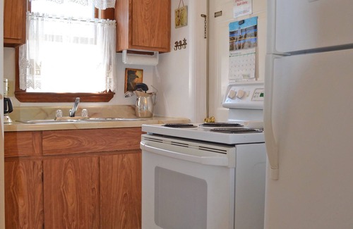 Gloucester Apartment | Garden by the Sea: Relax & enjoy wonderful coastal views. Walk to the beach!