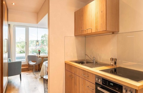Pelham Apartment | Gartenzimmer, 30 qm Untergeschoss, Kombinierter Wohn- & Schlafbereich