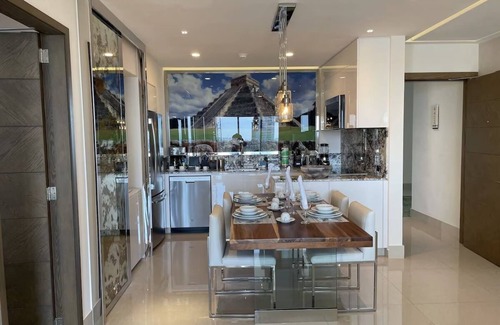 Puerto Juarez Condo | Garza Blanca 2 Bedroom Beach Suite with ocean-facing deck.