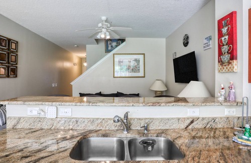 Crestwynd Bay House | Gated townhome with pool & playground - fast WiFi, W/D - snowbirds welcome