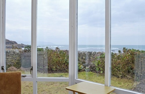 Bellochantuy Cottage | A detached cottage with views across to Gigha and the Paps of Jura.