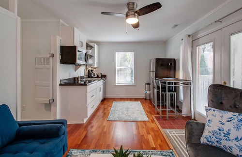 Salemtown Apartment | Germantown one bedroom suite with view of lush garden and hot tub