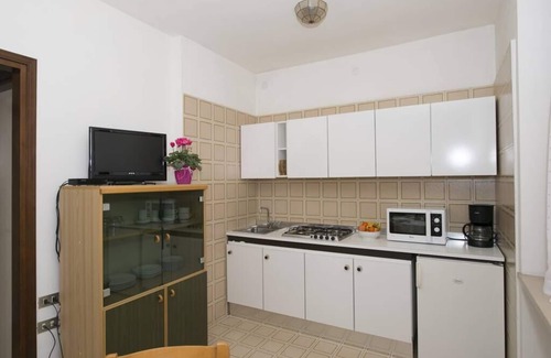 Frader Apartment | Gianni with 2 bedrooms, in the ground floor with garden and lake view