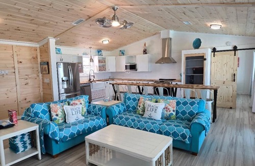 St. George Island House | Giggle - A cheerful SGI beach cottagenSwimming and Tanning/Todler pools added
