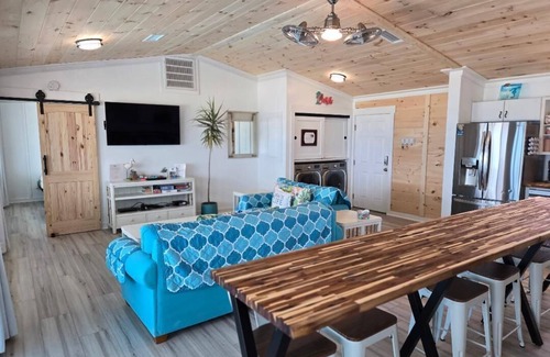 St. George Island House | Giggle - A cheerful SGI beach cottagenSwimming and Tanning/Todler pools added