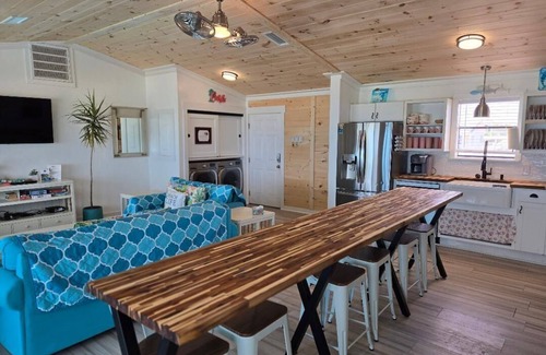 St. George Island House | Giggle - A cheerful SGI beach cottagenSwimming and Tanning/Todler pools added
