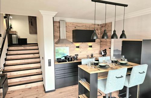 Niedersfeld Apartment | Gipfelpanorama Winterberg mit Berg- und Seeblick, Boxspringbett mit ausfahrbarem TV