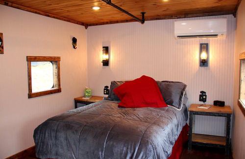 Clyde House | Glamping Caboose Rental Perfect for Families near Clyde, North Carolina
