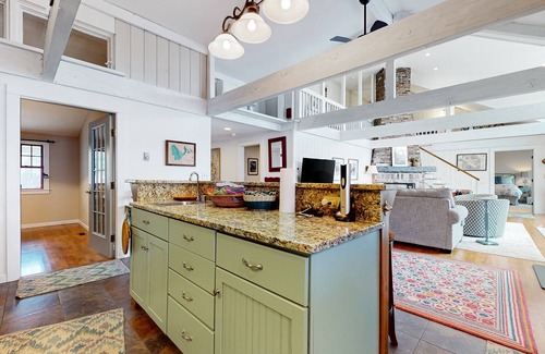 Center Ossipee House | Glistening lakefront home with fireplace, kitchen, dock, canoe, grill, & patio
