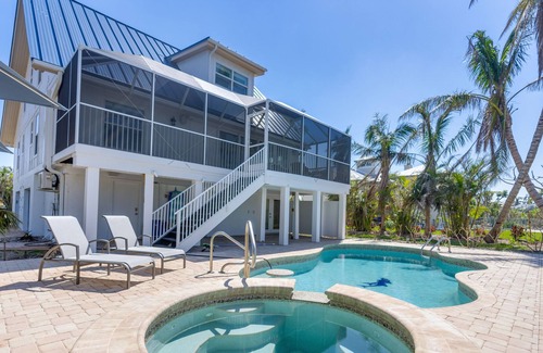 The Dunes House | Golf course home beautifully designed with stunning sunsets!