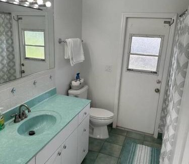 Lake Worth House | Golf course view & heated pool home