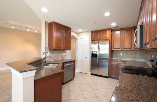 Naples House | Golf/Lake View 2 Bed+Den Coach Home In Amenity Rich Community, the Quarry!