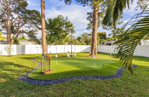 Boynton Beach House | Golfers Green Retreat with 35' Heated Pool & Tiki. Pet Friendly!