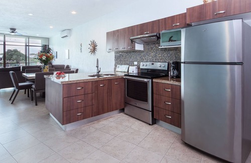 Puerto Aventuras Condo | Gorgeous 3 Bdrm Lagoon Condo Pool Wifi Kayak paddle boards Golf Cart Available