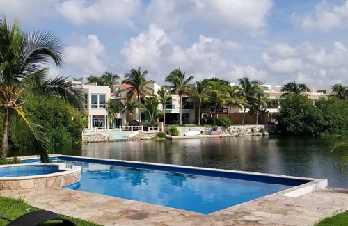 Puerto Aventuras Condo | Gorgeous 3 Bdrm Lagoon Condo Pool Wifi Kayak paddle boards Golf Cart Available