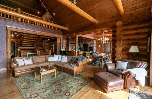 Wautoma Cabin | Gorgeous 7 bdrm loglodge fireplaces sauna hottub sleeps 24 great view pier boats