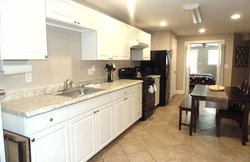 Warrensburg House | GORGEOUS AND MODERN describes this 6 bedroom home .