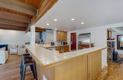 West Hills House | Gorgeous bay front gem with decks, grill, fireplace, wood stove, & private sauna