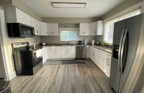 Eastpointe House | Gorgeous Colonial Home Game-room in basement.