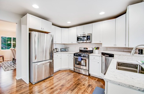 Camano Island House | Gorgeous home with gas fireplace & enormous deck + mountain & water views