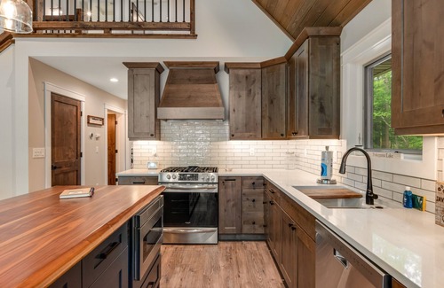 Lac du Flambeau House | Gorgeous lakefront home with private dock, canoe, kayak, firepit & fireplace