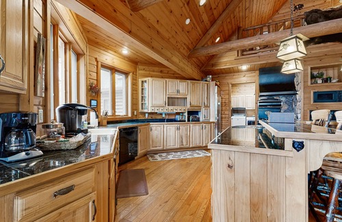 Three Lakes House | Gorgeous lakefront lodge with dock, deck, game room & firepit
