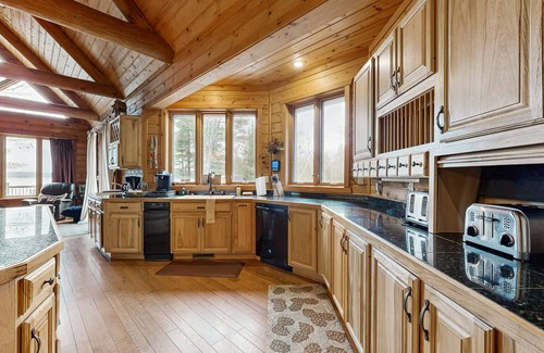 Three Lakes House | Gorgeous lakefront lodge with dock, deck, game room & firepit
