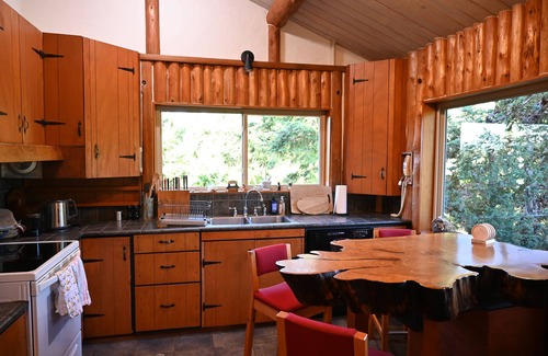 Port Angeles House | Gorgeous log cabin homestead amidst gardens just west of Port Angeles