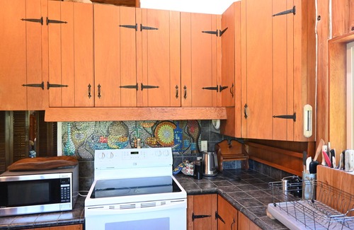 Port Angeles House | Gorgeous log cabin homestead amidst gardens just west of Port Angeles