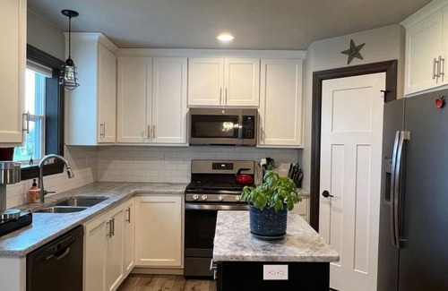 Pulaski House | Gorgeous, modern house, backyard connects with community park and fields.