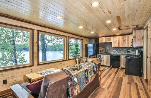 St Germain House | Gorgeous remodeled lakeside cabin with fireplace, personal dock, and sandy beach