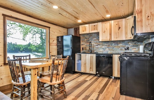 St Germain House | Gorgeous remodeled lakeside cabin with fireplace, personal dock, and sandy beach